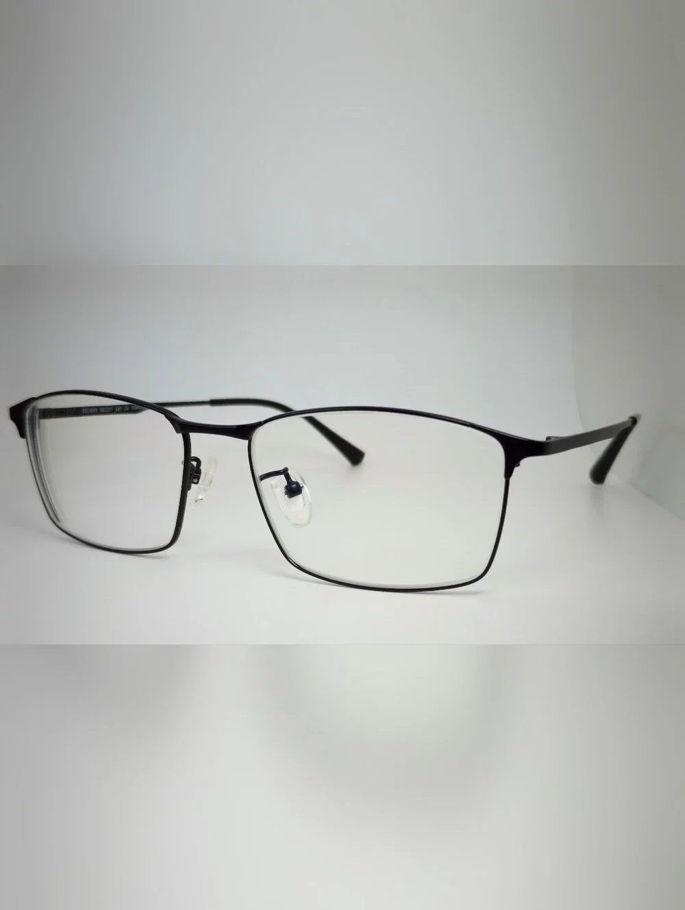 Decider. Womens Black Low Gloss Rectangular Titanium Frame.